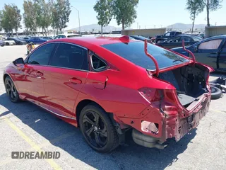 2018 Honda Accord EX-L with VIN 1HGCV2F58JA009555, listed as a IAAI auction lot 42128596 with 94,399 mi miles and . Bid and sale history available at DreamBid. Image 3.