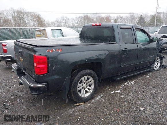 2018 Chevrolet Silverado 1500 LT with VIN 2GCVKREC6J1102304, listed as a IAAI auction lot 41800456 with 82,000 mi miles and . Bid and sale history available at DreamBid. Image 4.