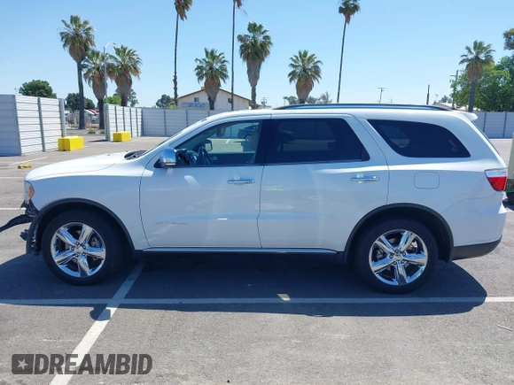 2013 Dodge Durango Citadel z VIN 1C4RDHEG9DC674734, wystawiony jako IAAI lot #42298801 z przebiegiem 138 002 mil mil oraz . Historia ofert i sprzedaży dostępna na DreamBid. Obrazek 14.