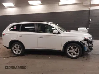 2015 Mitsubishi Outlander SE with VIN JA4AZ3A39FZ012490, listed as a IAAI auction lot 41405104 with 95,131 mi miles and . Bid and sale history available at DreamBid. Image 14.