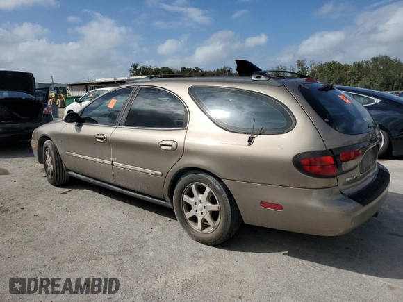 2003 Mercury Sable LS Premium z VIN 1MEFM59S03A606329, wystawiony jako Copart lot #79331624 z przebiegiem 152 059 mil mil oraz Nie do naprawy. Historia ofert i sprzedaży dostępna na DreamBid. Obrazek 2.