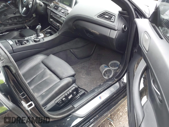 2015 BMW 6 Series 640i with VIN WBA6A0C55FGB53603, listed as a IAAI auction lot 41543996 with 71,046 mi miles and . Bid and sale history available at DreamBid. Image 5.