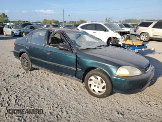 1997 Honda Civic LX with VIN 1HGEJ6570VL028030, listed as a Copart auction lot 69479674 with 160,958 mi miles and Salvage Title. Bid and sale history available at carsss.com. Image 4.
