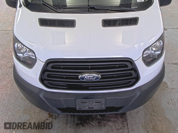 2019 Ford Transit with VIN 1FTYE1YM0KKB31938, listed as a IAAI auction lot 42667322 with 196,239 mi miles and . Bid and sale history available at DreamBid. Image 28.
