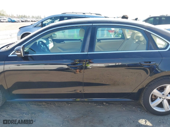 2013 Volkswagen Passat SE w/Sunroof with VIN 1VWBH7A36DC020984, listed as a IAAI auction lot 41883902 with 169,916 mi miles. Bid and sale history available at carsss.com. Image 14.