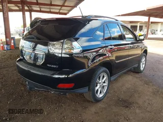 2008 Lexus RX with VIN 2T2HK31UX8C072143, listed as a IAAI auction lot 41788431 with 163,364 mi miles. Bid and sale history available at carsss.com. Image 4.