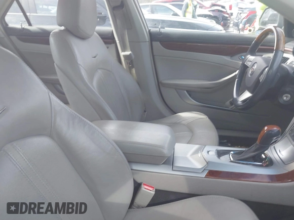 2012 Cadillac CTS Luxury with VIN 1G6DE5E58C0143175, listed as a IAAI auction lot 41612743 with 148,764 mi miles and . Bid and sale history available at DreamBid. Image 5.
