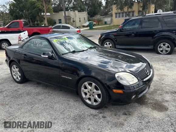 2002 Mercedes-Benz SLK 230 Kompressor with VIN WDBKK49FX2F265220, listed as a Copart auction lot 79324194 with 90,860 mi miles and Clean title. Bid and sale history available at DreamBid. Image 1.