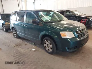 2009 Dodge Grand Caravan SE z VIN 2D8HN44E09R621583, wystawiony jako IAAI lot #41529158 z przebiegiem 222 799 mil mil oraz . Historia ofert i sprzedaży dostępna na DreamBid. Obrazek 1.