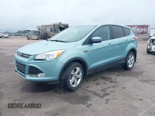 2013 Ford Escape SE with VIN 1FMCU9G97DUB37456, listed as a IAAI auction lot 42542046 with 150,919 mi miles and . Bid and sale history available at DreamBid. Image 2.