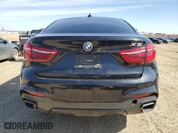 2018 BMW X6 xDrive35i z VIN 5UXKU2C52J0X51407, wystawiony jako Copart lot #54449325 z przebiegiem 125 767 mil mil oraz Szkoda całkowita • Salvage title. Historia ofert i sprzedaży dostępna na DreamBid. Obrazek 6.