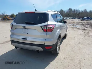 2017 Ford Escape Titanium with VIN 1FMCU9JD3HUE03686, listed as a IAAI auction lot 42016950 with 82,299 mi miles. Bid and sale history available at carsss.com. Image 4.