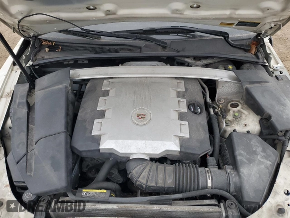 2009 Cadillac CTS AWD z VIN 1G6DT57V390101668, wystawiony jako Copart lot #83592544 z przebiegiem 107 368 mil mil oraz Szkoda całkowita • Salvage title. Historia ofert i sprzedaży dostępna na DreamBid. Obrazek 13.