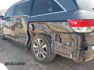 2015 Honda Odyssey Touring Elite with VIN 5FNRL5H98FB034700, listed as a IAAI auction lot 42019265 with 226,829 mi miles and . Bid and sale history available at DreamBid. Image 6.