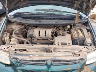 1997 Dodge Grand Caravan with VIN 1B4GT54L6VB439994, listed as a IAAI auction lot 42206857 with 242,219 mi miles and . Bid and sale history available at DreamBid. Image 10.