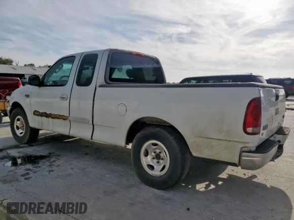2003 Ford F-150 XL with VIN 2FTRX17233CA07764, listed as a Copart auction lot 66994195 with Not provided miles and Clean title. Bid and sale history available at DreamBid. Image 2.