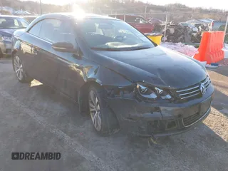 2013 Volkswagen Eos Lux with VIN WVWFW8AH8DV003927, listed as a IAAI auction lot 41351984 with 202,377 mi miles and . Bid and sale history available at DreamBid. Image 1.