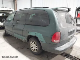 1999 Dodge Caravan SE with VIN 2B4GP44G0XR318805, listed as a IAAI auction lot 41521636 with 213,212 mi miles. Bid and sale history available at carsss.com. Image 3.