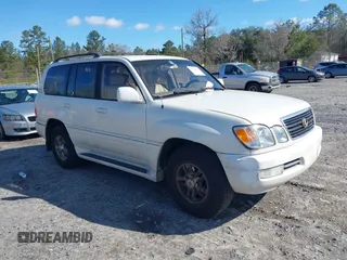 2002 Lexus LX 470 with VIN JTJHT00W123522570, listed as a IAAI auction lot 41739017 with 266,396 mi miles. Bid and sale history available at carsss.com. Image 1.
