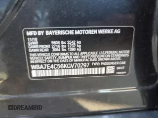 2019 BMW 7 Series 740i xDrive z VIN WBA7E4C56KGV70297, wystawiony jako Copart lot #78858504 z przebiegiem 81 874 mil mil oraz Szkoda całkowita • Salvage title. Historia ofert i sprzedaży dostępna na DreamBid. Obrazek 13.