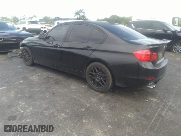 2013 BMW 3 Series 328i with VIN WBA3A5G55DNP26709, listed as a IAAI auction lot 37057796 with 103,168 mi miles and . Bid and sale history available at DreamBid. Image 3.