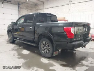2017 Nissan Titan SV with VIN 1N6AA1E58HN502777, listed as a IAAI auction lot 41612504 with 142,920 mi miles. Bid and sale history available at carsss.com. Image 3.