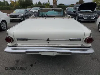 1964 Dodge Dart z VIN 7442677958, wystawiony jako Copart lot #81670574 z przebiegiem 61 374 mil mil oraz Tytuł czysty. Historia ofert i sprzedaży dostępna na DreamBid. Obrazek 6.