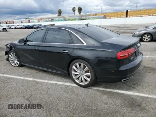 2018 Audi A8 z VIN WAU44AFD9JN000151, wystawiony jako Copart lot #44697923 z przebiegiem 91 402 mil mil oraz . Historia ofert i sprzedaży dostępna na DreamBid. Obrazek 2.
