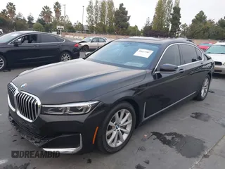 2022 BMW 7 Series 740i with VIN WBA7T2C0XNCJ31291, listed as a IAAI auction lot 40623307 with 98,877 mi miles. Bid and sale history available at carsss.com. Image 2.