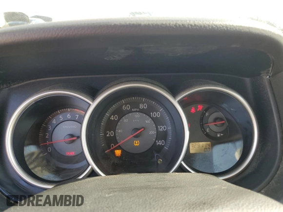 2009 Nissan Versa 1.6 z VIN 3N1CC11E49L499117, wystawiony jako Copart lot #56486285 z przebiegiem 129 114 mil mil oraz Szkoda całkowita • Salvage title. Historia ofert i sprzedaży dostępna na DreamBid. Obrazek 9.