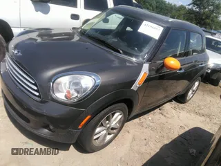 2012 MINI Countryman with VIN WMWZB3C53CWM29495, listed as a IAAI auction lot 42196053 with 77,741 mi miles and . Bid and sale history available at DreamBid. Image 2.