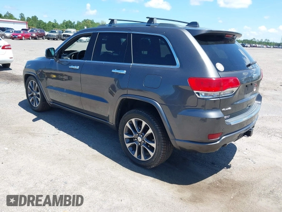 2017 Jeep Grand Cherokee Overland with VIN 1C4RJFCG2HC641791, listed as a IAAI auction lot 42566654 with 116,764 mi miles and . Bid and sale history available at DreamBid. Image 3.