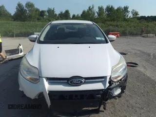2013 Ford Focus SE with VIN 1FADP3F28DL215983, listed as a IAAI auction lot 42659890 with 117,912 mi miles and . Bid and sale history available at DreamBid. Image 12.