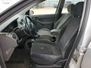 2004 Ford Focus with VIN 3FAFP37Z14R102723, listed as a Copart auction lot 44138195 with 220,354 mi miles and Salvage title. Bid and sale history available at DreamBid. Image 7.