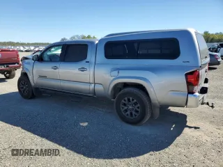 2021 Toyota Tacoma SR5 with VIN 3TMDZ5BN0MM103256, listed as a Copart auction lot 50101675 with 49,673 mi miles and Salvage title. Bid and sale history available at DreamBid. Image 2.