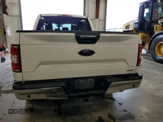 2019 Ford F-150 XL with VIN 1FTFW1E4XKFA16846, listed as a Copart auction lot 61345795 with 128,587 mi miles and Salvage title. Bid and sale history available at DreamBid. Image 6.