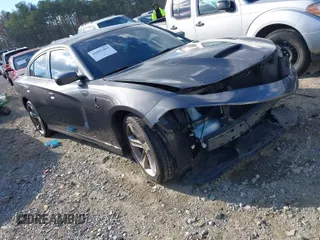 2021 Dodge Charger GT with VIN 2C3CDXHGXMH605662, listed as a IAAI auction lot 41005469 with 63,166 mi miles and . Bid and sale history available at DreamBid. Image 1.