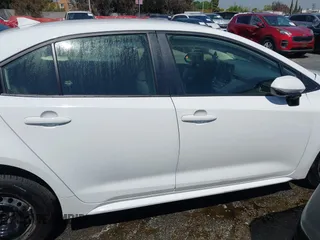 2023 Toyota Corolla Hybrid LE with VIN JTDBCMFE5P3026631, listed as a IAAI auction lot 41920841 with 105,932 mi miles. Bid and sale history available at carsss.com. Image 14.