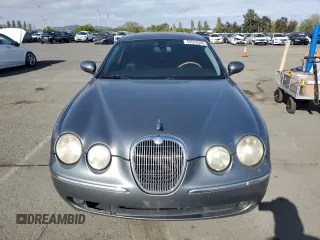 2005 Jaguar S-Type with VIN SAJWA01T15FN13800, listed as a Copart auction lot 53576305 with 182,533 mi miles and Salvage Title. Bid and sale history available at DreamBid. Image 5.