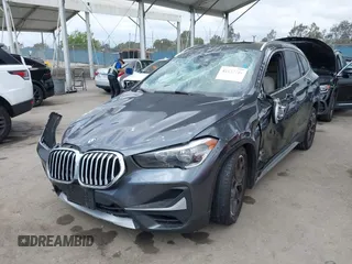 2021 BMW X1 xDrive28i with VIN WBXJG9C03M3M80011, listed as a IAAI auction lot 42137781 with 132,969 mi miles. Bid and sale history available at carsss.com. Image 17.