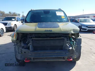 2015 Jeep Renegade Trailhawk with VIN ZACCJBCT6FPC11721, listed as a IAAI auction lot 41759053 with 95,499 mi miles and . Bid and sale history available at DreamBid. Image 13.