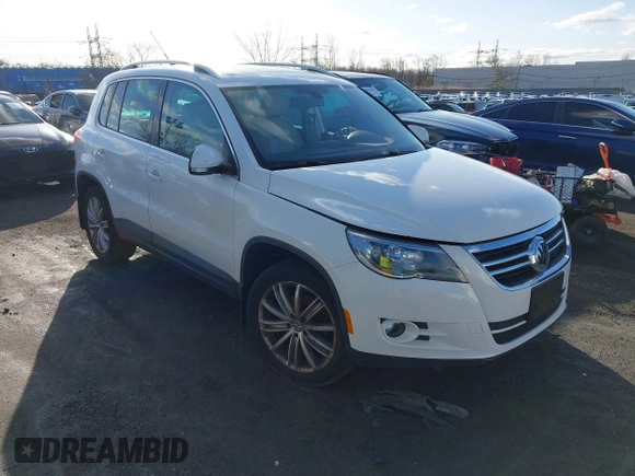 2011 Volkswagen Tiguan SE with VIN WVGBV7AX8BW536365, listed as a IAAI auction lot 41854029 with 126,916 mi miles and . Bid and sale history available at DreamBid. Image 1.