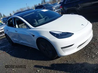 2023 Tesla Model 3 z VIN 5YJ3E1EA0PF611244, wystawiony jako IAAI lot #41455102 z przebiegiem 21 867 mil mil oraz . Historia ofert i sprzedaży dostępna na DreamBid. Obrazek 1.