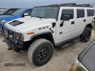 2005 Hummer H2 SUV with VIN 5GRGN23UX5H116341, listed as a Copart auction lot 76877704 with 145,778 mi miles and Salvage Title. Bid and sale history available at carsss.com. Image 1.