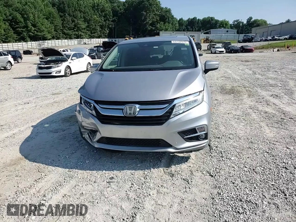 2018 Honda Odyssey Elite with VIN 5FNRL6H95JB062033, listed as a Copart auction lot 63732915 with 105,234 mi miles and Salvage title. Bid and sale history available at DreamBid. Image 14.
