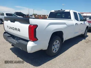 2022 Toyota Tundra with VIN 5TFKB5CDXNX001458, listed as a IAAI auction lot 42640278 with 51,718 mi miles and . Bid and sale history available at DreamBid. Image 4.