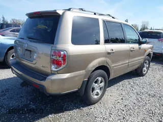 2006 Honda Pilot EX-L with VIN 2HKYF18566H561371, listed as a IAAI auction lot 41950296 with 145,579 mi miles and . Bid and sale history available at DreamBid. Image 4.