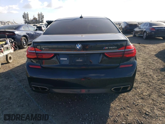 2018 BMW 7 Series M760i xDrive with VIN WBA7H6C50JG614781, listed as a Copart auction lot 83689234 with 49,873 mi miles and Salvage Title. Bid and sale history available at carsss.com. Image 6.