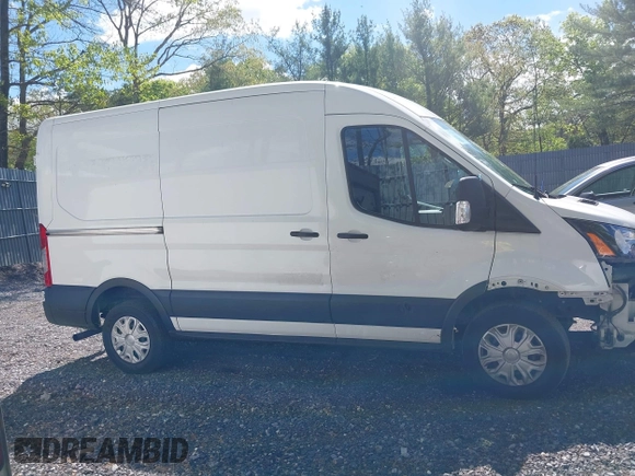 2020 Ford Transit Cargo z VIN 1FTBR1C8XLKA04894, wystawiony jako IAAI lot #42176726 z przebiegiem 84 154 mil mil oraz . Historia ofert i sprzedaży dostępna na DreamBid. Obrazek 13.