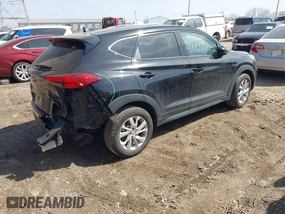 2019 Hyundai Tucson SE with VIN KM8J2CA4XKU852946, listed as a IAAI auction lot 41784214 with 120,857 mi miles. Bid and sale history available at carsss.com. Image 4.